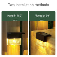 Two inset photos show a black outdoor wall light in different mounting positions, with text reading 'Hang in 180°' and 'Placed at 90°'. The top of the image has the heading 'Two installation methods'.
