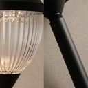 Goya PT0301 solar path light close-up showing ribbed PC shade and black aluminium pole