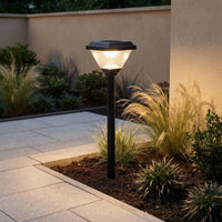 Striva PT0303 solar lawn light illuminating a modern garden pathway