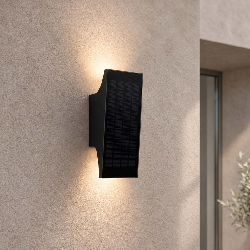 PT0710 solar up and down wall light providing warm architectural lighting on an exterior wall
