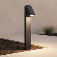 PT0723 solar pathway light providing warm downward illumination along a garden path
