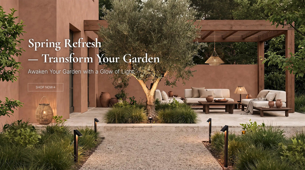 Outdoor patio and garden scene with a pergola, seating area, plants, and warm terracotta walls. Large overlaid text reads 'Spring Refresh — Transform Your Garden' with smaller copy below and a 'SHOP NOW' button.