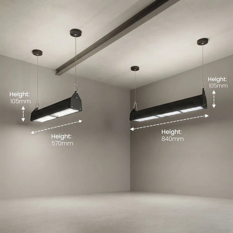 Two black rectangular LED grow lights hanging from ceiling fixtures in a minimalist gray room, with white dimension arrows and text labels showing height measurements of 105mm and 1570mm.