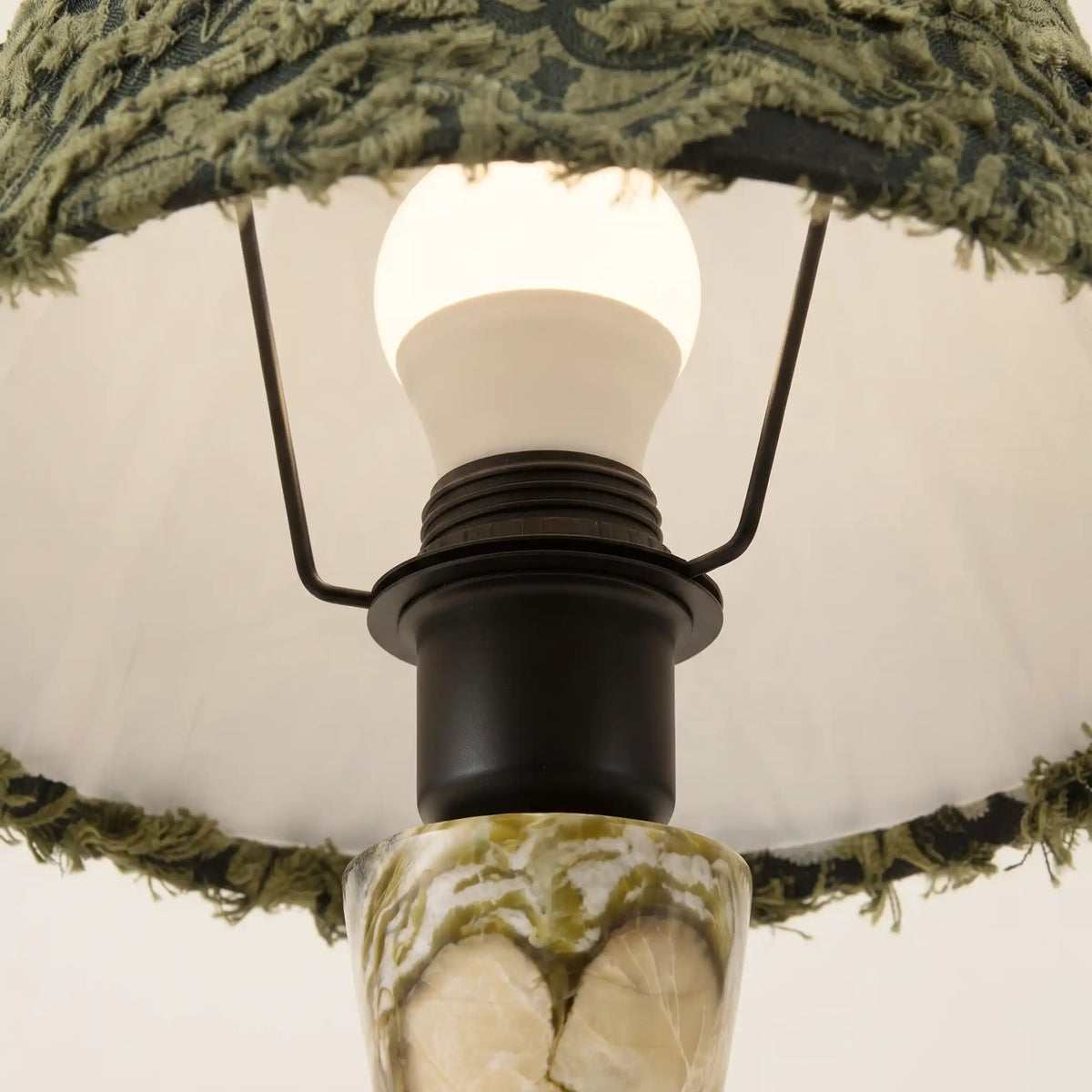 Close-up of the E27 bulb and lamp holder inside the Forest Ember fabric shade
