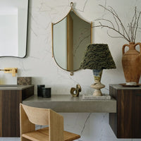 Forest Ember Twilight Marble table lamp styled on a console beneath a decorative mirror