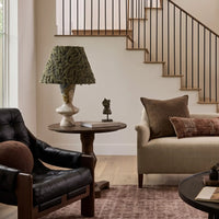 Forest Ember Twilight Marble table lamp on a round side table in a neutral living room
