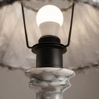 E27 bulb and lamp holder inside the fabric shade of the Freehand marble table lamp