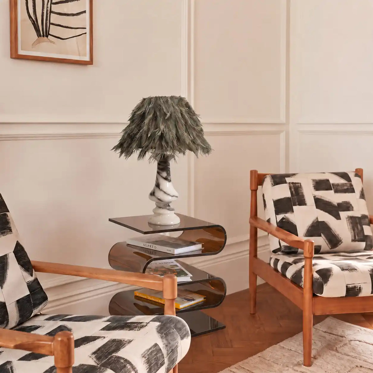 Freehand Arabescato Marble Table Lamp styled on a side table in a modern seating area