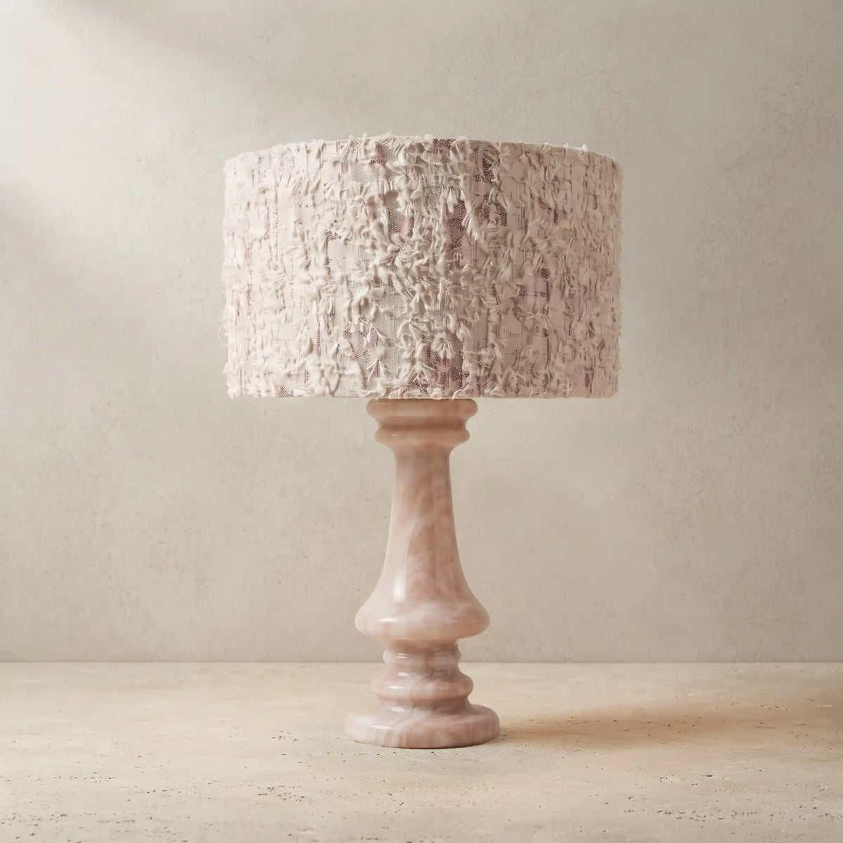 Rainbow Rose Marble Table Lamp with a textured fabric shade on a light surface
