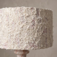 Close-up of the textured fabric shade above the Rainbow Rose Marble lamp base
